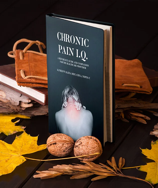 Chronic Pain I.Q. by Alfred W. Maina — dark hardcover medical reference guide with walnuts and autumn leaves